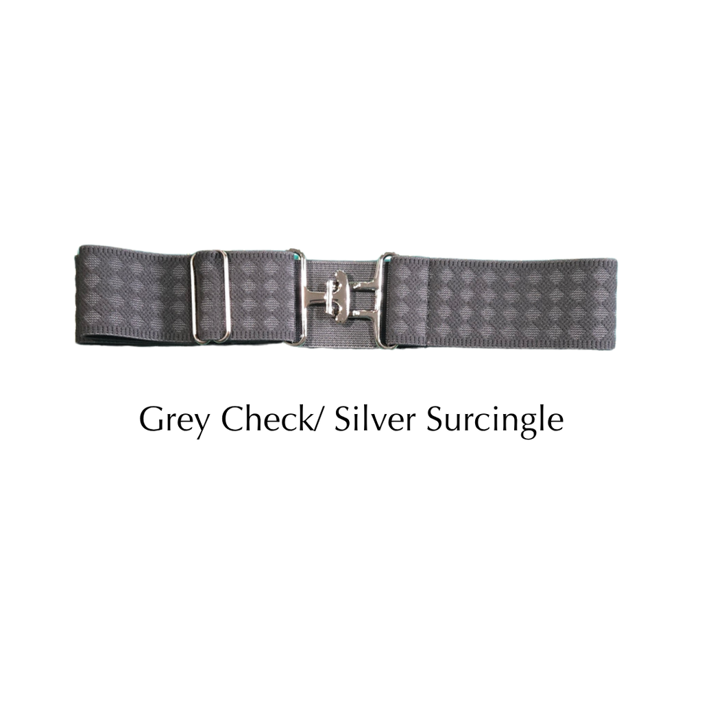 A grey checkered surcingle belt with a silver buckle, displayed horizontally on a white background with the text 'Grey Check/ Silver Surcingle' underneath.