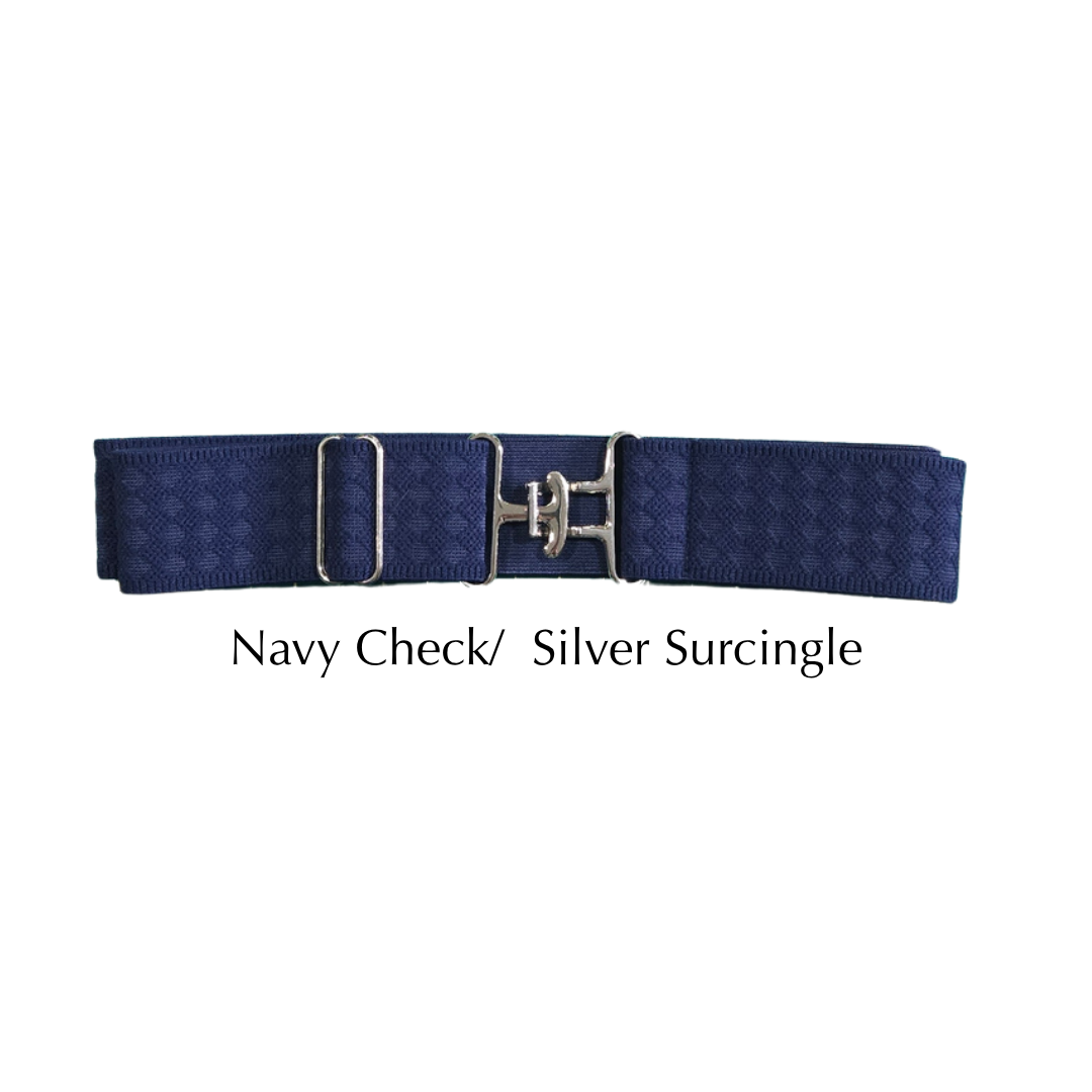 A navy blue woven belt with a silver metal buckle and silver surcingle loops, shown against a plain white background with the text 'Navy Check/ Silver Surcingle' below it.