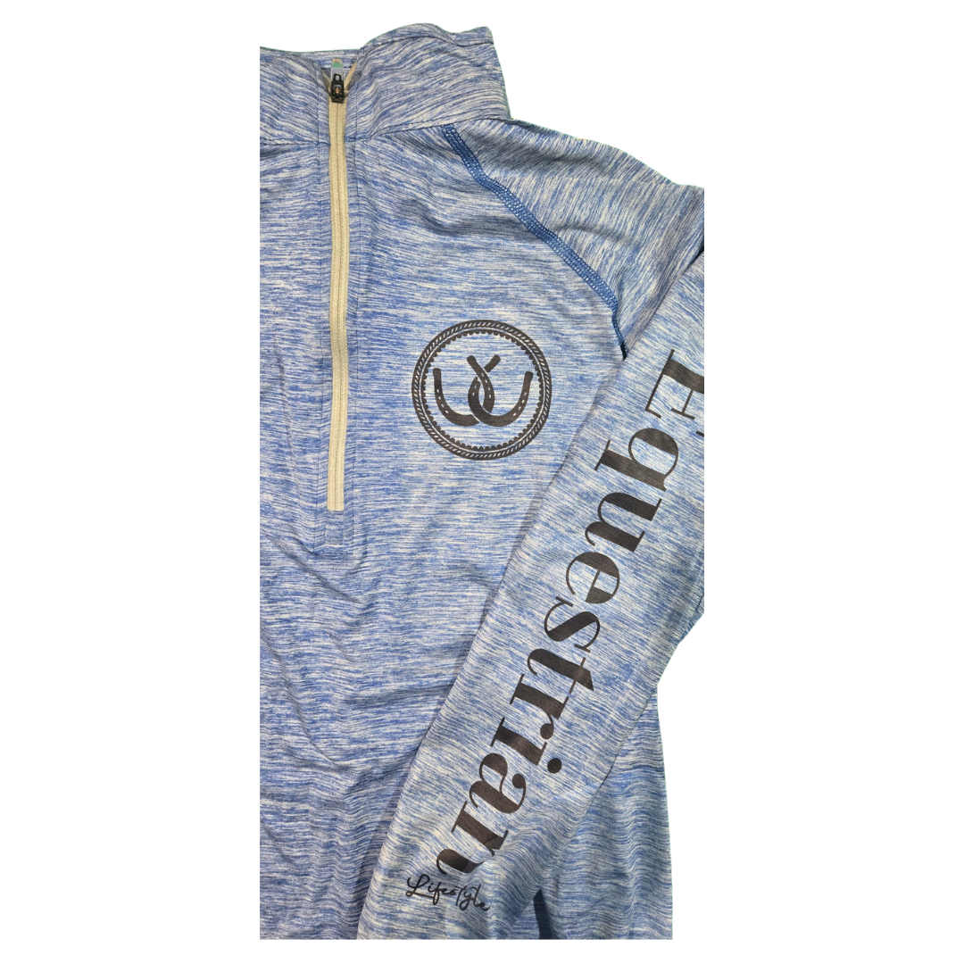A close-up of a heathered blue and white quarter-zip athletic pullover with a circular horseshoe logo on the chest and 'Equestrian' printed vertically on the sleeve.