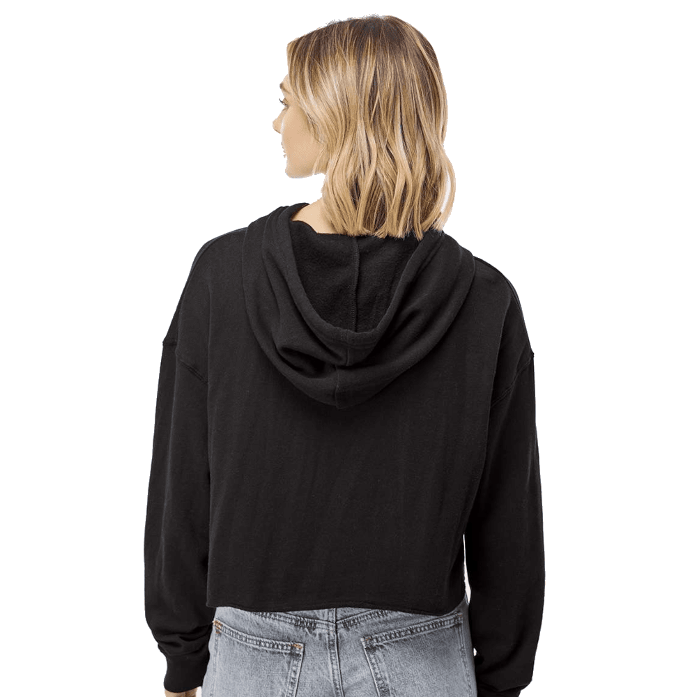 A woman shown from the back wearing a black cropped hoodie and light-wash blue jeans against a plain white background.