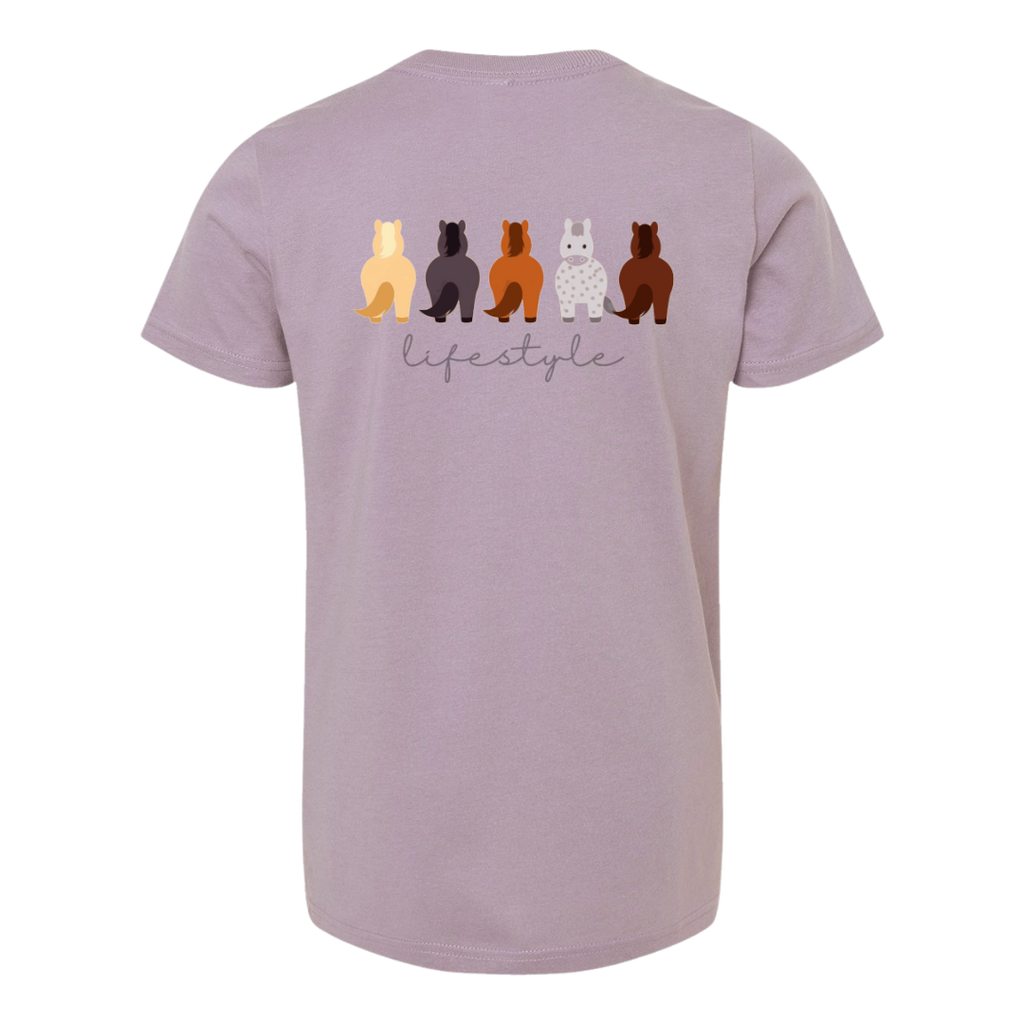 A light purple short-sleeve t-shirt shown from the back, featuring a graphic of five stylized horses in various colors above the word 'lifestyle' in gray script.