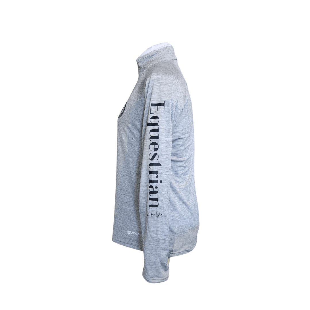 A light heather gray long-sleeve performance shirt shown in side profile, featuring 'Equestrian lifestyle' printed vertically in black on the right sleeve.