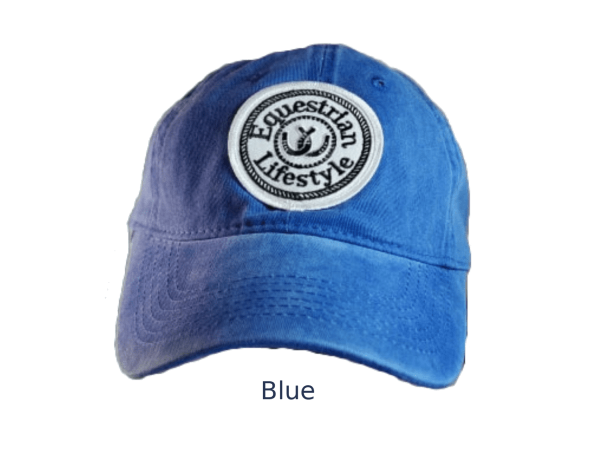 A blue baseball cap with a circular embroidered patch reading 'Equestrian Lifestyle' on the front, shown against a plain white background with the word 'Blue' below.