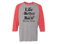 A 3/4 sleeve raglan baseball t-shirt with a heather gray body and red sleeves, featuring the black printed text 'Life is Better at the Barn Equestrian Lifestyle' on the chest.
