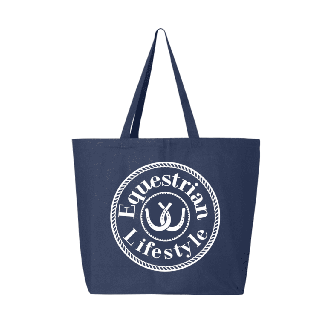 A navy blue canvas tote bag with two shoulder straps, featuring a white circular graphic on the front that reads 'Equestrian Lifestyle' around a horsehoe and horseshoe design, shown against a plain white background.