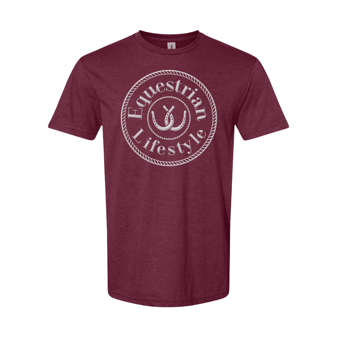 A heather maroon short-sleeve crewneck t-shirt featuring a distressed white circular graphic on the chest that reads 'Equestrian Lifestyle' with a horseshoe icon in the center.