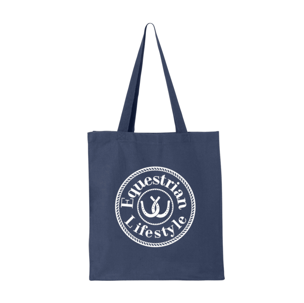 A navy blue canvas tote bag with two shoulder straps, featuring a white circular graphic on the front that reads 'Equestrian Lifestyle' with an horseshoe symbol inside.