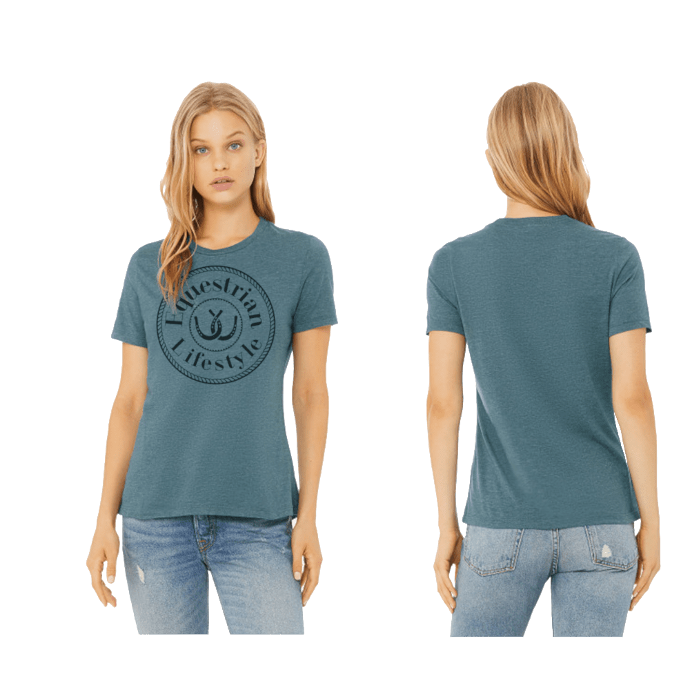 A woman modeling a heathered slate blue t-shirt with a black circular Equestrian Lifestyle graphic on the front, shown in both front and back views against a plain white background.