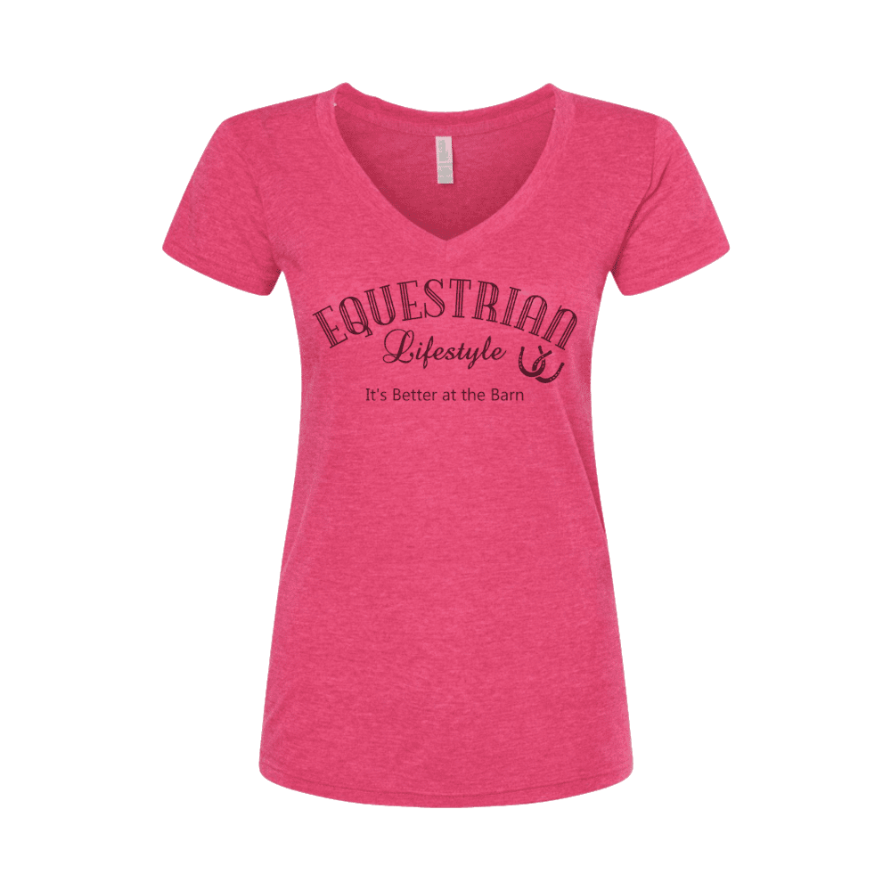 A women's heather pink V-neck t-shirt with a dark pink graphic on the front that reads 'EQUESTRIAN Lifestyle' and 'It's Better at the Barn' with a horseshoe symbol.