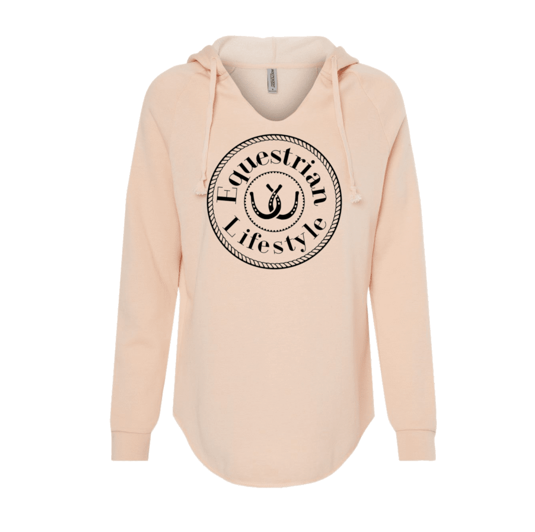 A light peach-pink pullover hoodie with a black circular graphic on the chest reading 'Equestrian Lifestyle' around a horseshoe, shown on a plain white background.