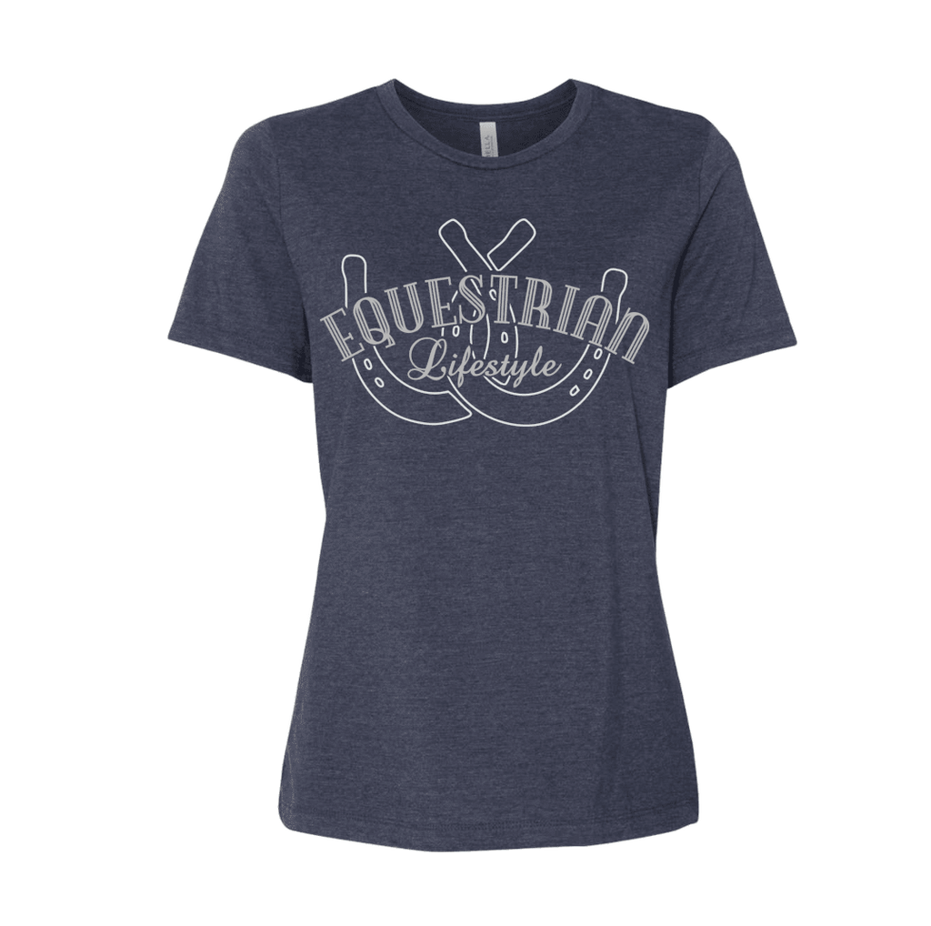 A women's short-sleeve crewneck t-shirt in heathered navy blue, featuring a white graphic print on the front with the words 'EQUESTRIAN Lifestyle'  over a horseshoe design, shown against a plain white background.