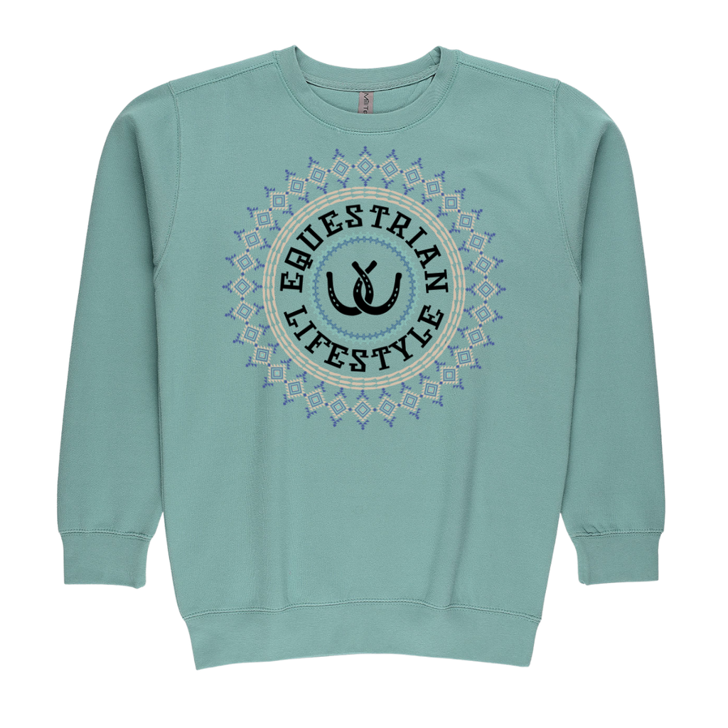A light teal crewneck sweatshirt featuring a circular graphic on the chest with the words 'EQUESTRIAN LIFESTYLE' and a horse silhouette, surrounded by a geometric aztec  pattern.