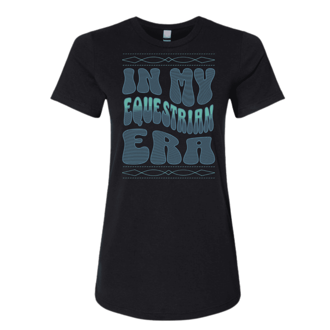 A black short-sleeve crewneck t-shirt with a retro-style graphic on the front reading 'IN MY EQUESTRIAN ERA' in textured teal and light blue lettering, displayed on a clean white background.