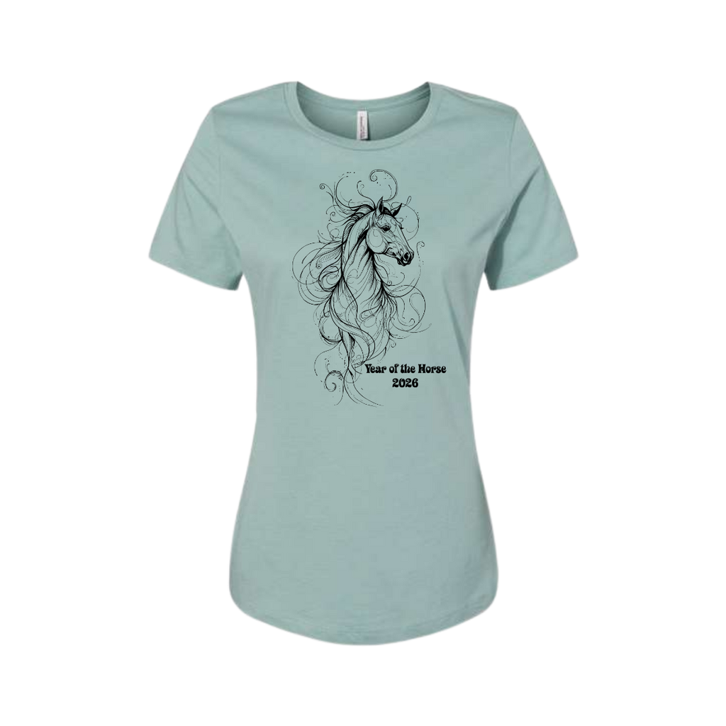 A light blue-green short-sleeve t-shirt with a black line art graphic of a horse with flowing hair and the text 'Year of the Horse 2026' printed on the front, displayed on a clean white background.