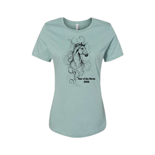 A light blue-green short-sleeve t-shirt with a black line art graphic of a horse with flowing hair and the text 'Year of the Horse 2026' printed on the front, displayed on a clean white background.