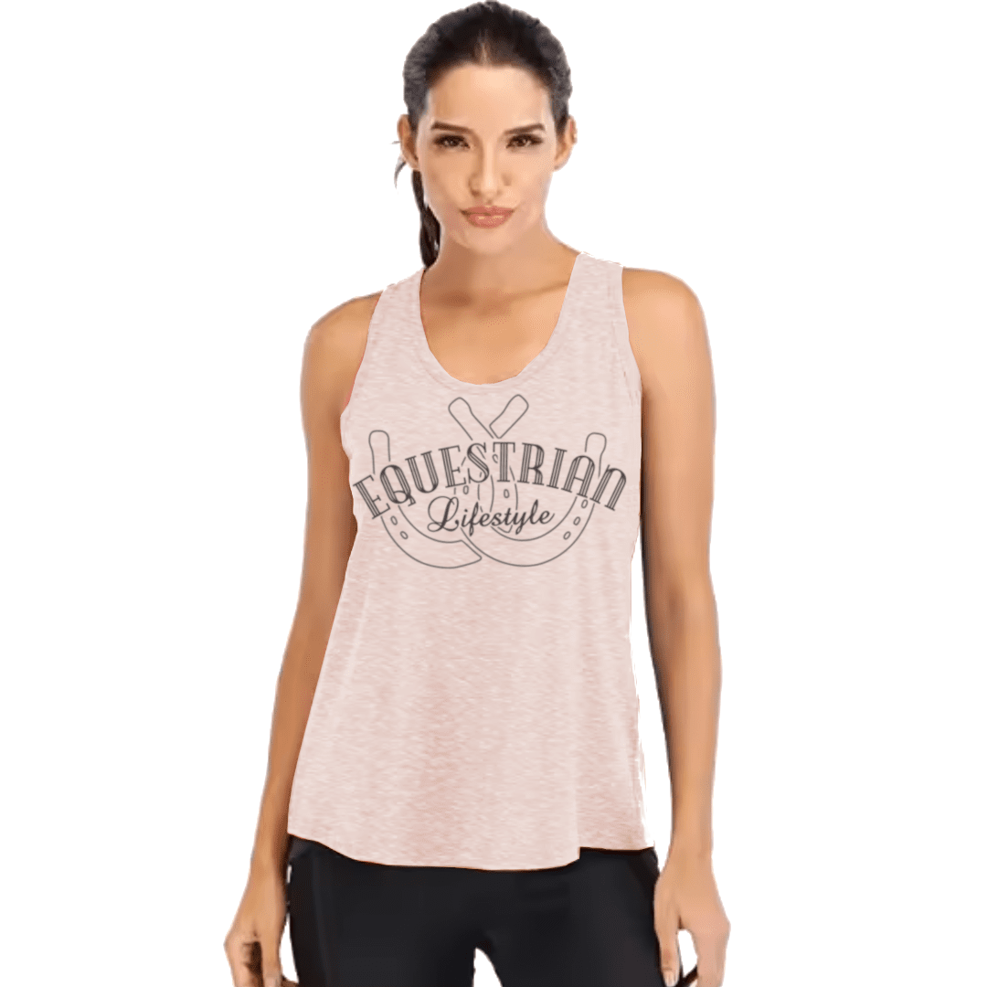 A woman modeling a sleeveless heather light pink tank top with a dark gray graphic that reads 'Equestrian Lifestyle' with horseshoes, against a plain white background.