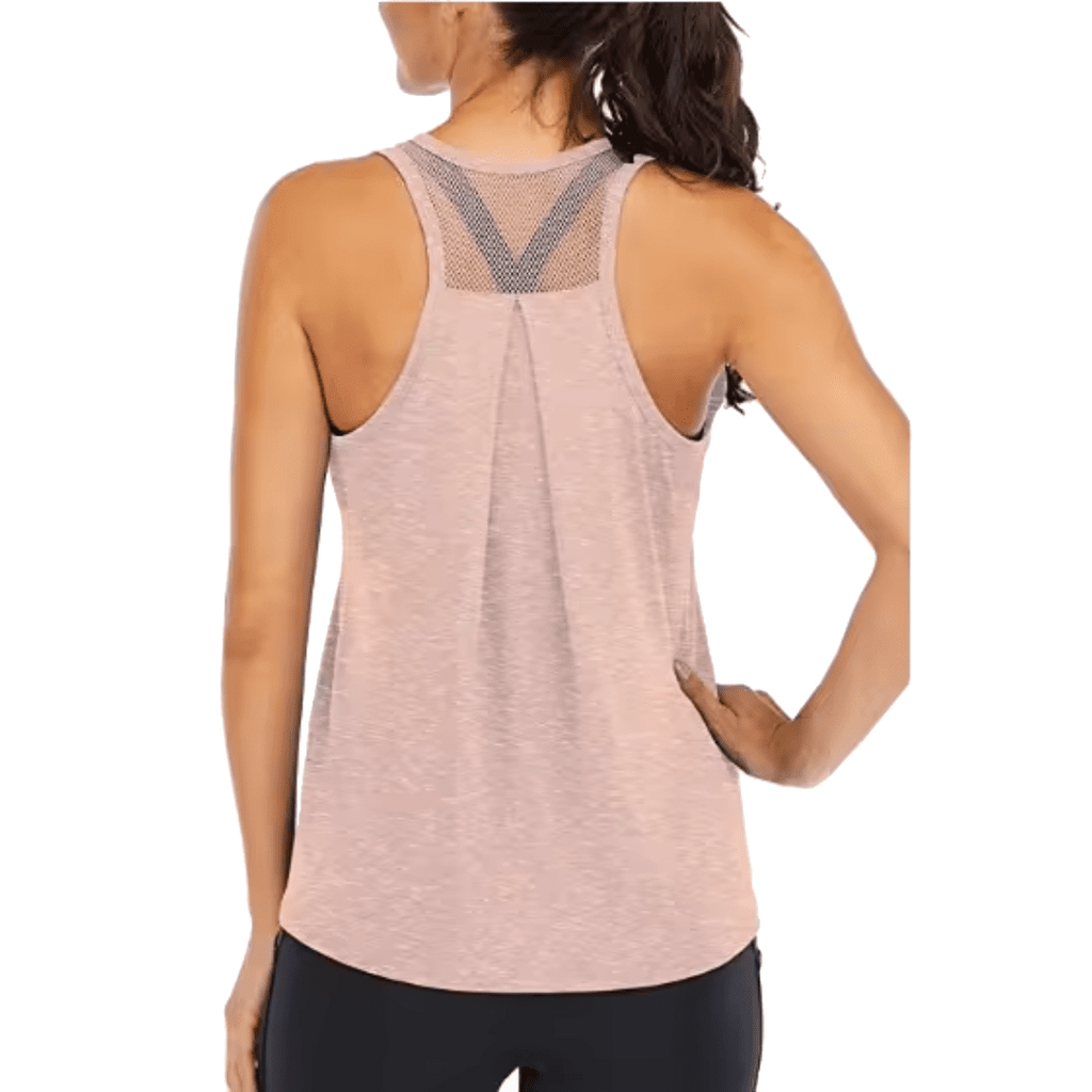 Rear view of a woman wearing a heathered light pink athletic tank top with a mesh V-back design, paired with black leggings, against a plain white background.