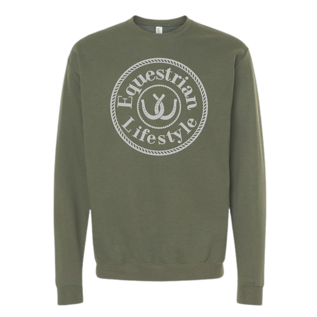 An olive green crewneck sweatshirt featuring a distressed white circular graphic on the chest that reads 'Equestrian Lifestyle' with a horseshoe symbol in the center.