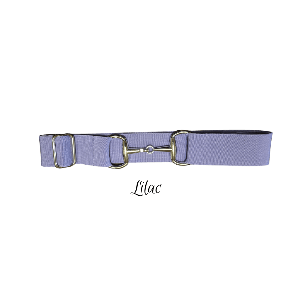 A lilac horse belt with silver-toned metal hardware, including a central snaffle and side rings, displayed on a plain white background with the text 'lilac' underneath.
