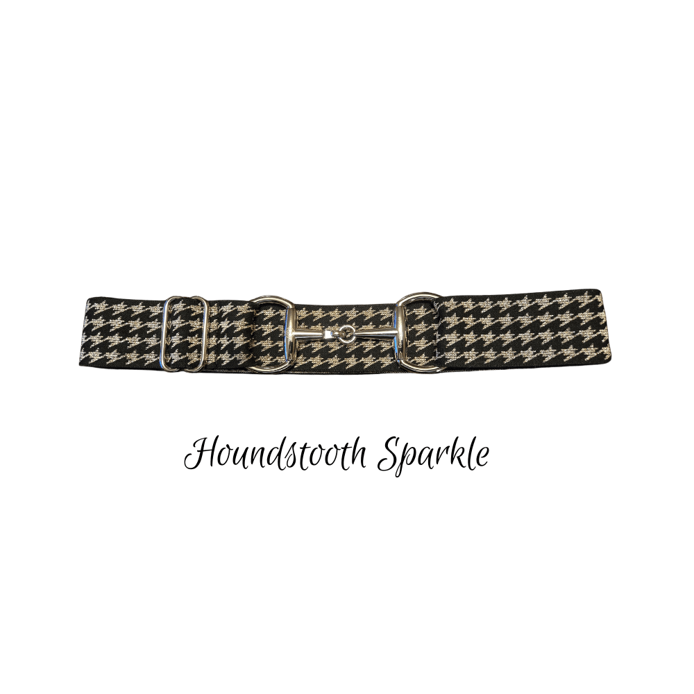 Abelt with a black and beige houndstooth pattern, featuring silver-tone metal hardware, shown against a plain white background with the text 'Houndstooth Sparkle' underneath.