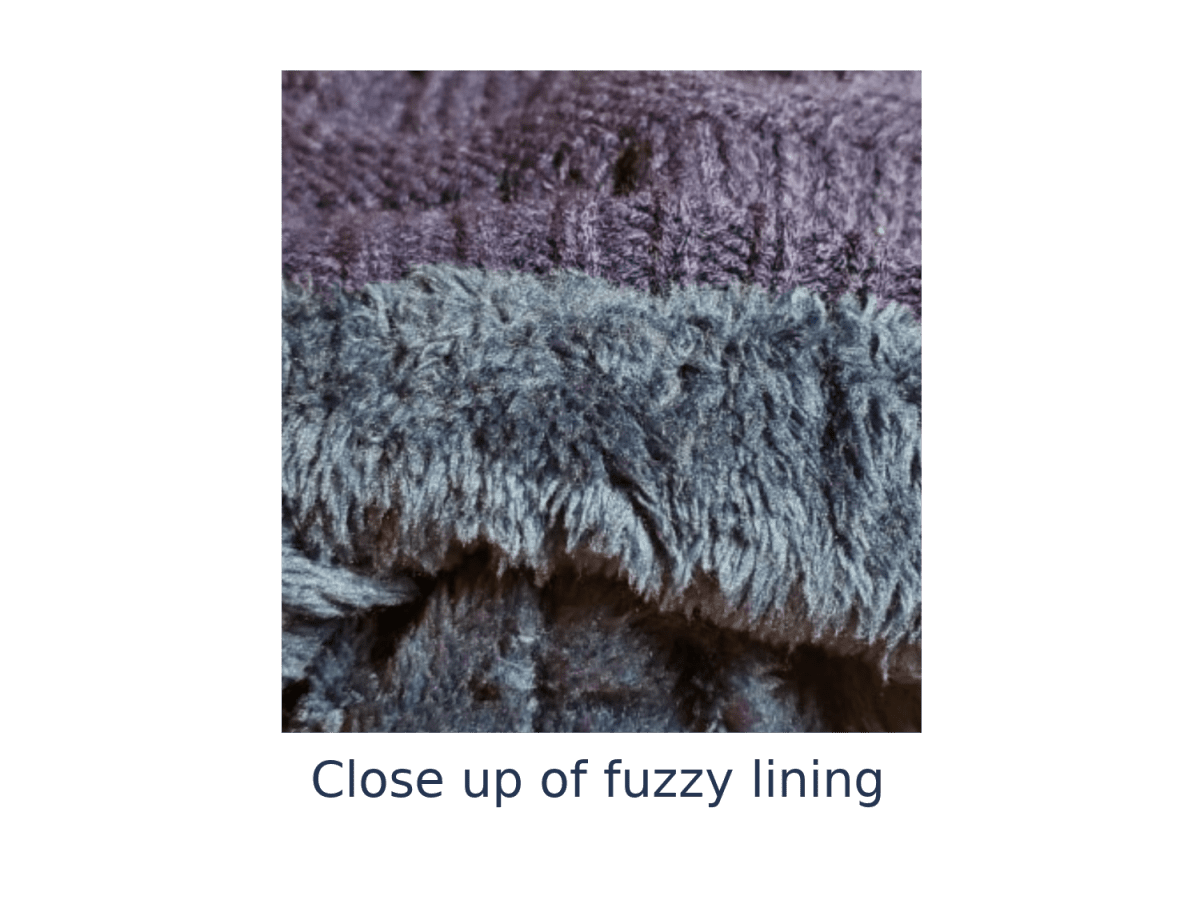 Close-up of a plush fuzzy textile surface in muted gray and lavender-purple tones, with the caption 'Close up of fuzzy lining' below on a white background.