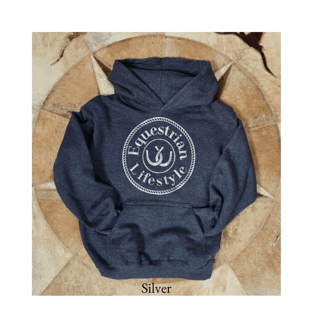 A navy blue heather pullover hoodie with a white circular 'Equestrian Lifestyle' graphic on the chest, laid flat on a rustic wood background. The word 'Silver' is printed below the hoodie.